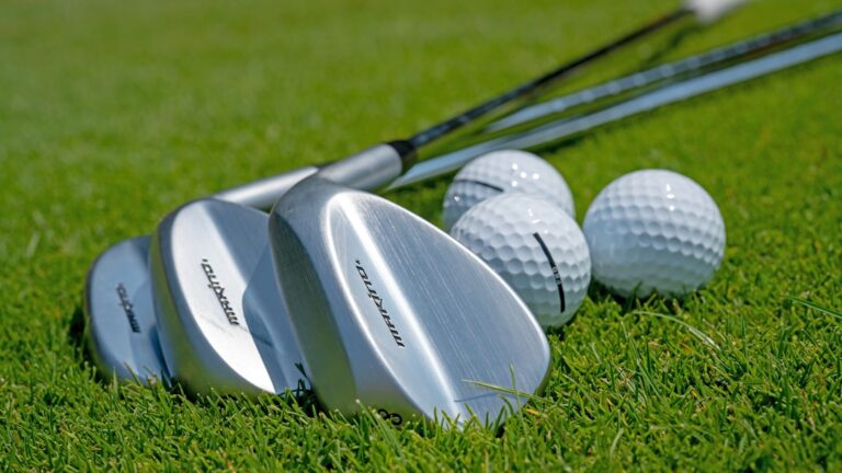 ：golf in japan manicured course mountain backdrop