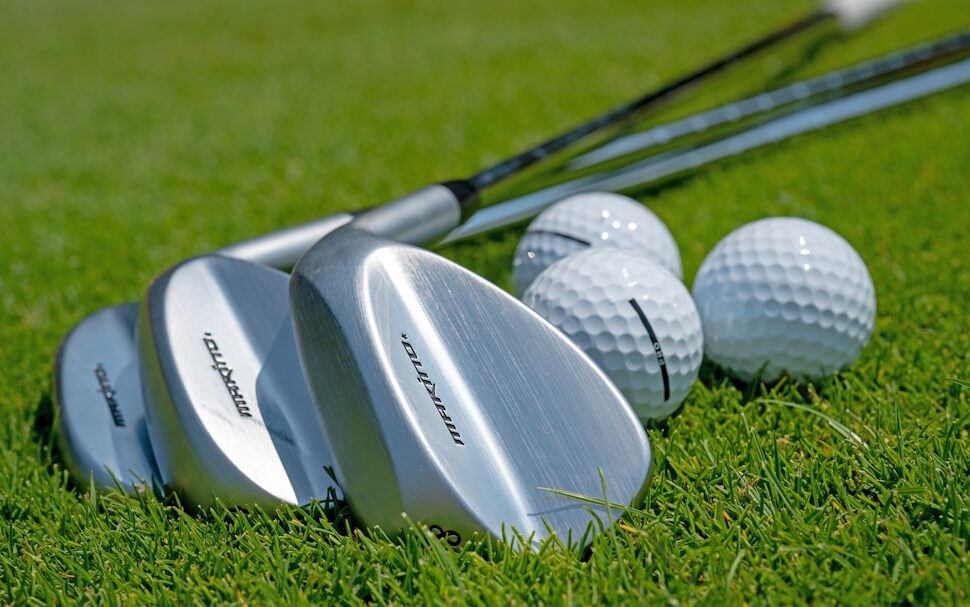 ：golf in japan manicured course mountain backdrop