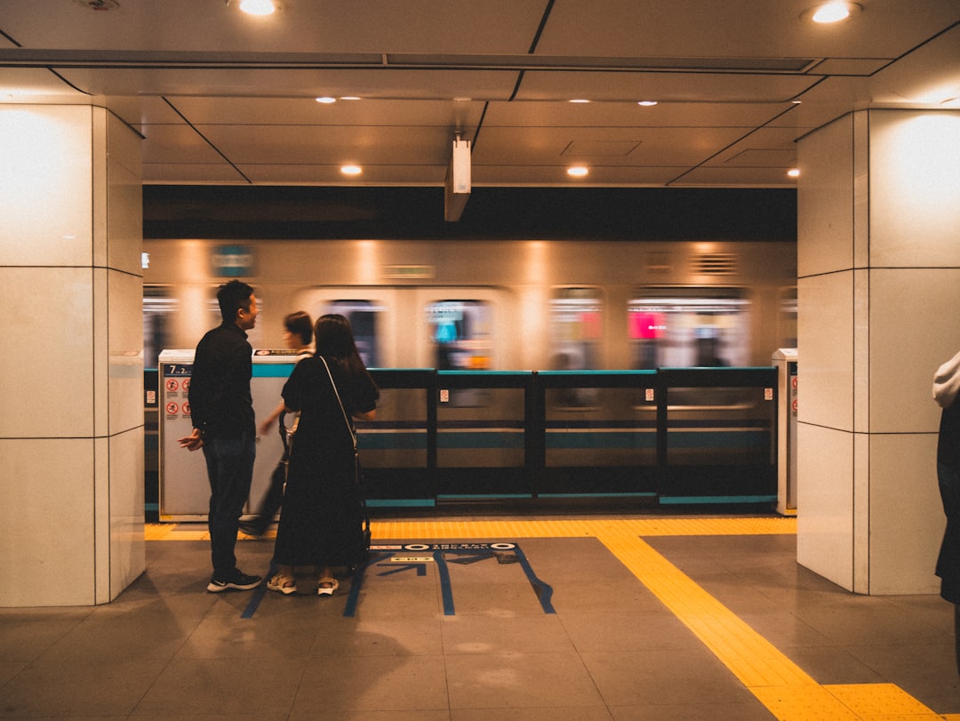 ：tapping an icoca card at a jr west station ticket gate