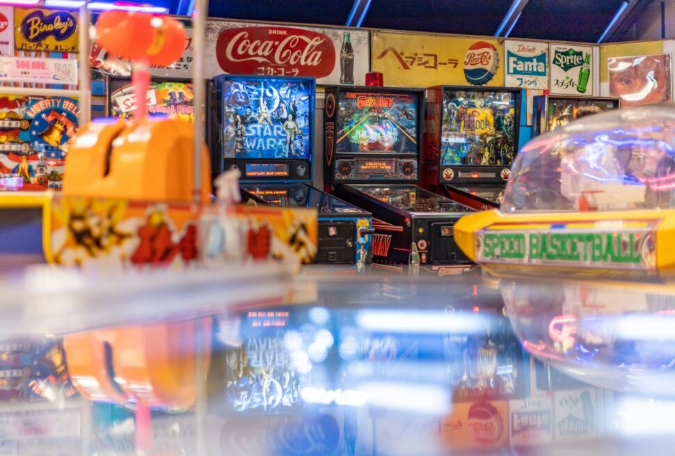 Arcade with vintage pinball machines and signs