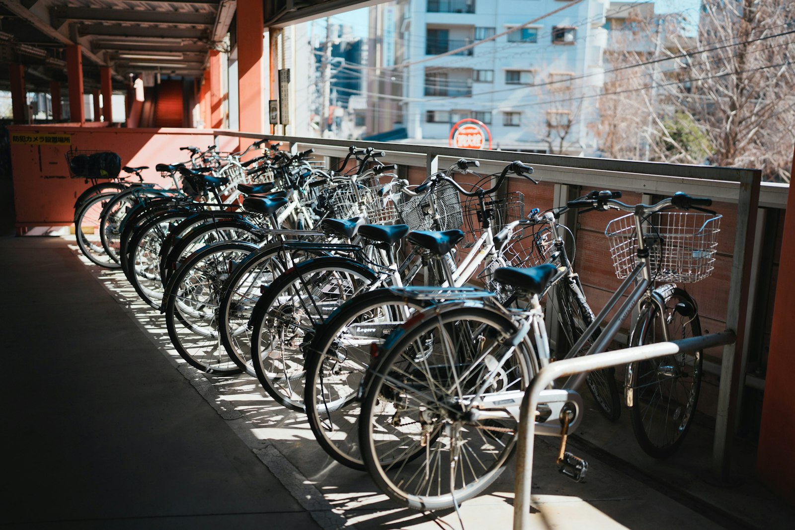 Bikes are parked neatly in a row