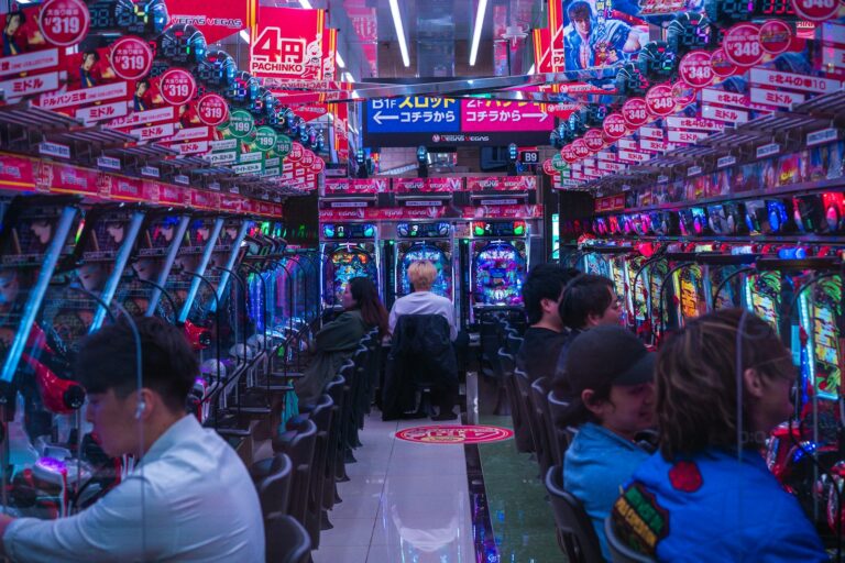 Vibrant pachinko parlor interior with people playing machines