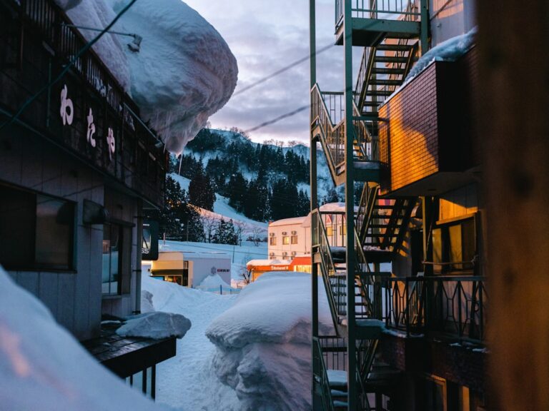 ：wooden soto-yu bathhouse in the snow at nozawa onsen village
