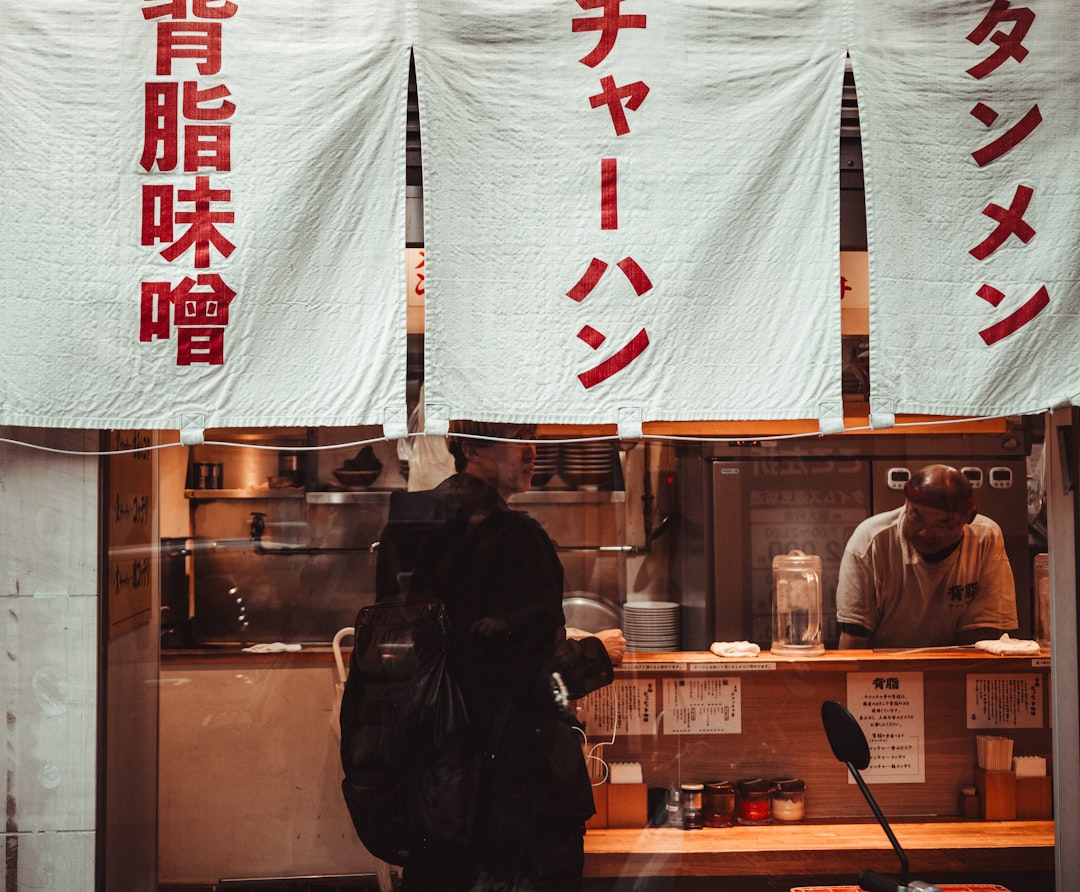 :credit card payment terminal at a shop counter in japan
