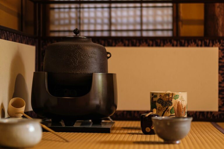Traditional japanese tea ceremony setting with kettle and cups