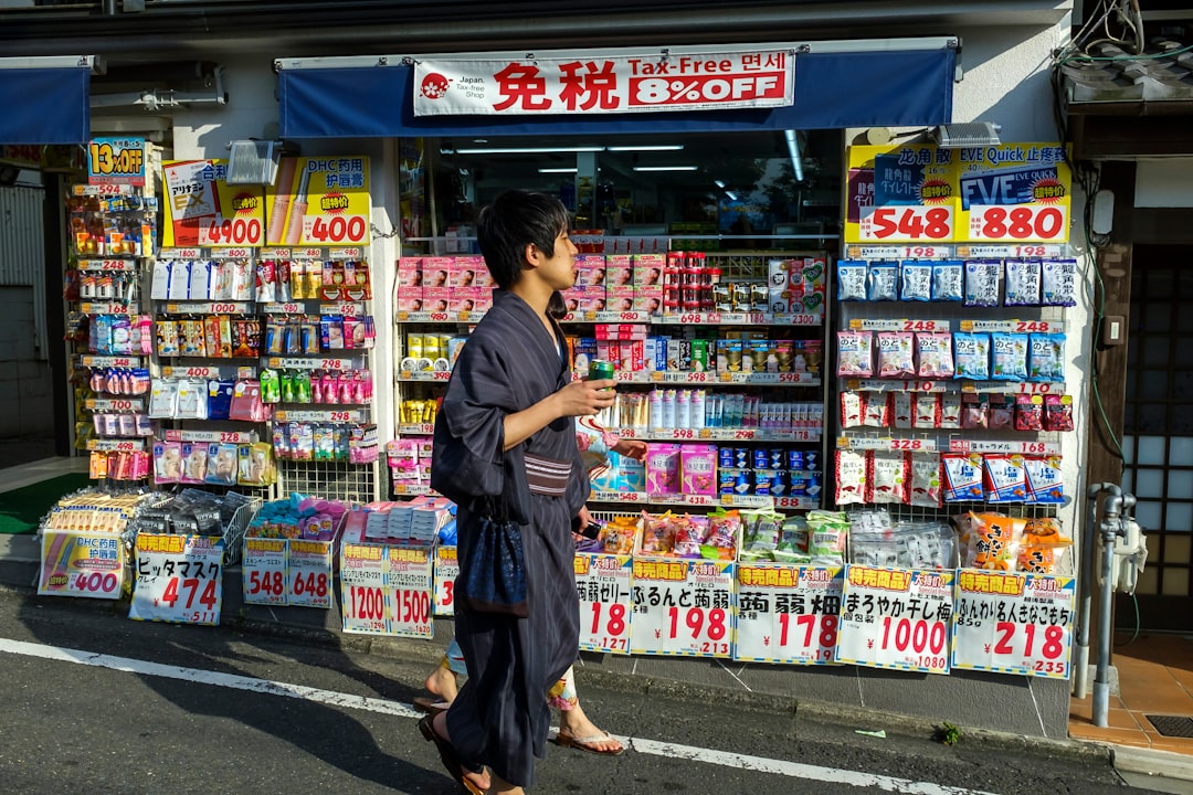 :prescription medicine and passport prepared for travel to japan