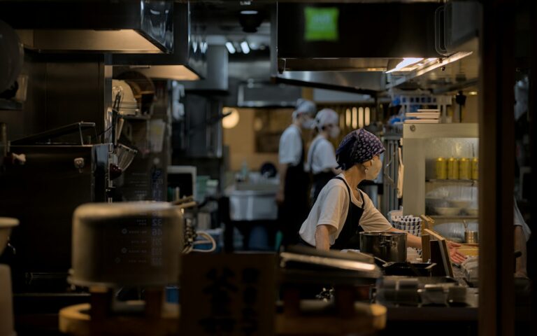 Restaurant staff works in a busy kitchen