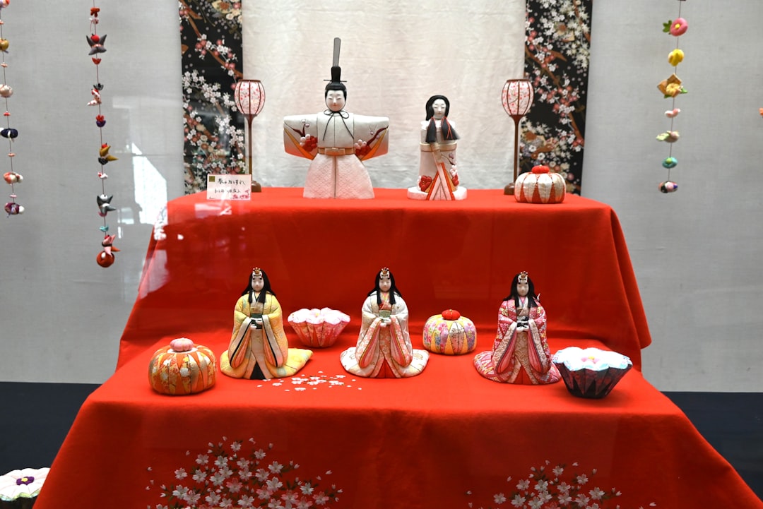 :thousands of hina dolls displayed on shrine steps at a public hinamatsuri festival