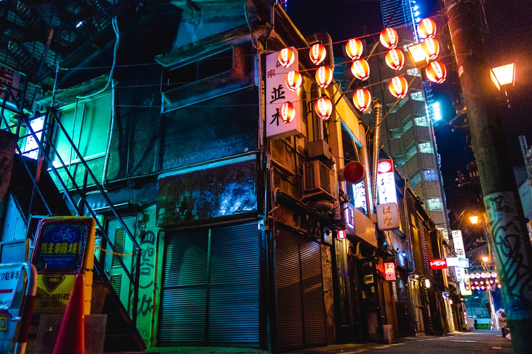 :walking to nonbei yokocho under the jr tracks from shibuya station