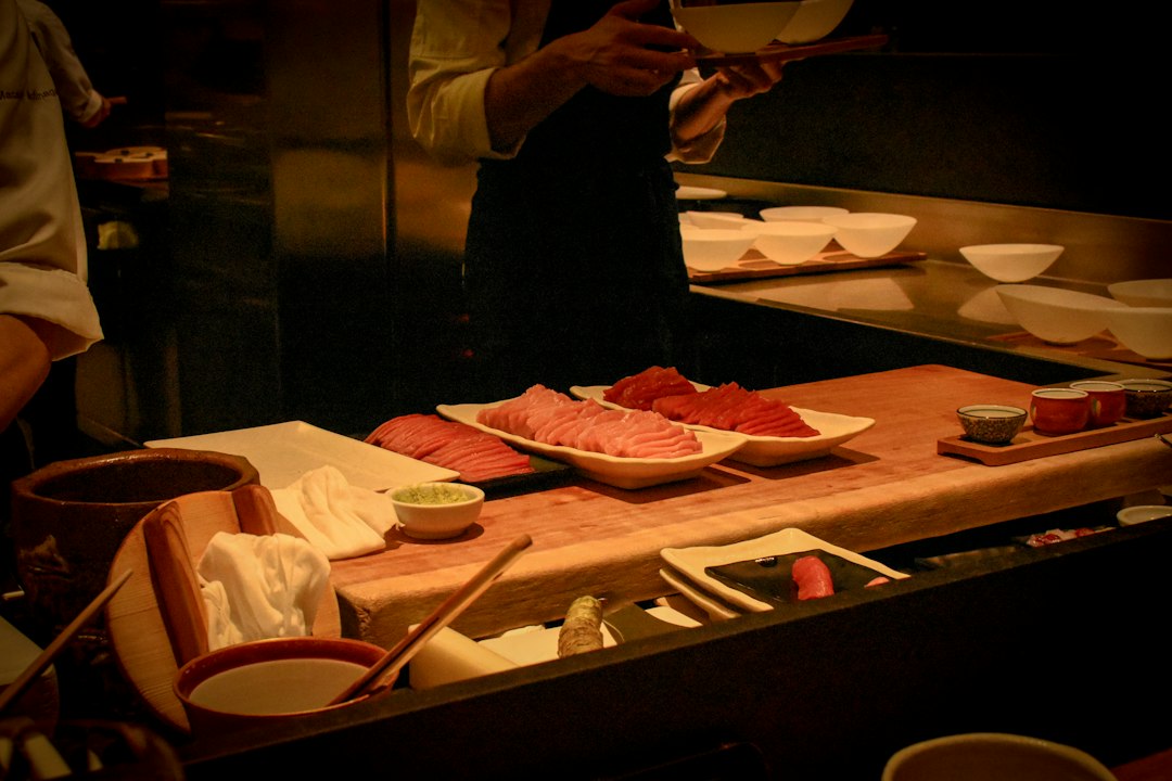 :temaki sushi party spread with sashimi, tamagoyaki, and nori