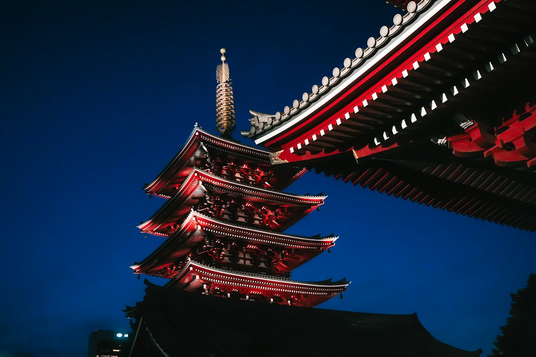 :chureito pagoda with mount fuji behind it in early morning light