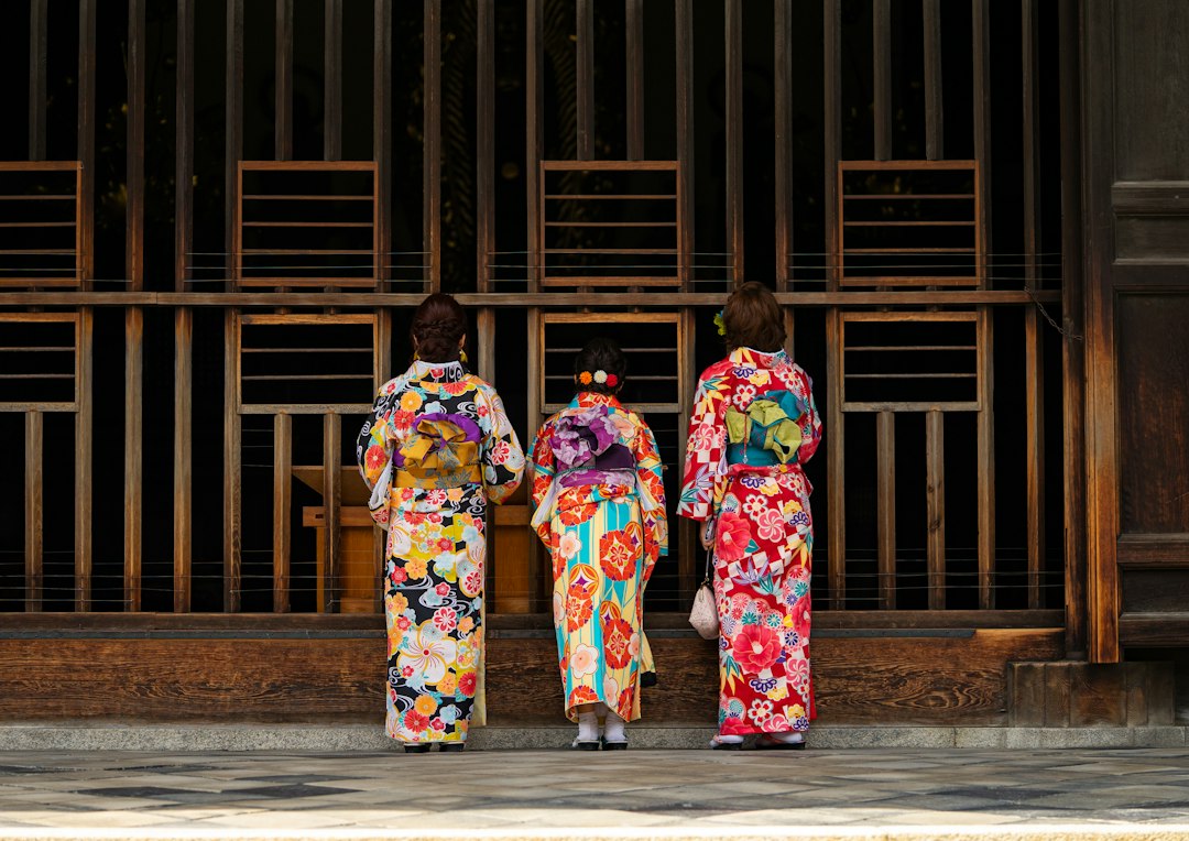:young women in furisode kimono on coming of age day in japan