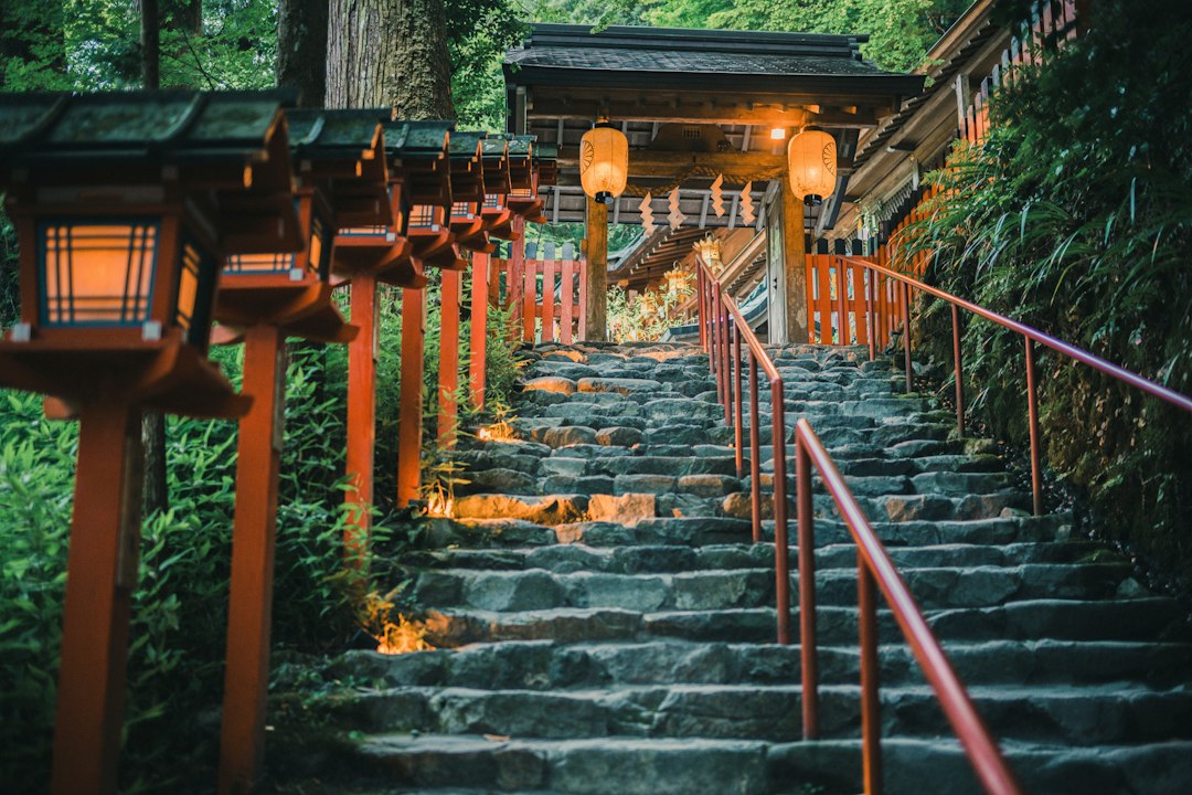 :stone lanterns on the approach to sumiyoshi taisha shrine osaka