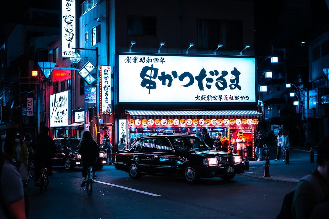 ：late night taxi on an osaka nightlife street