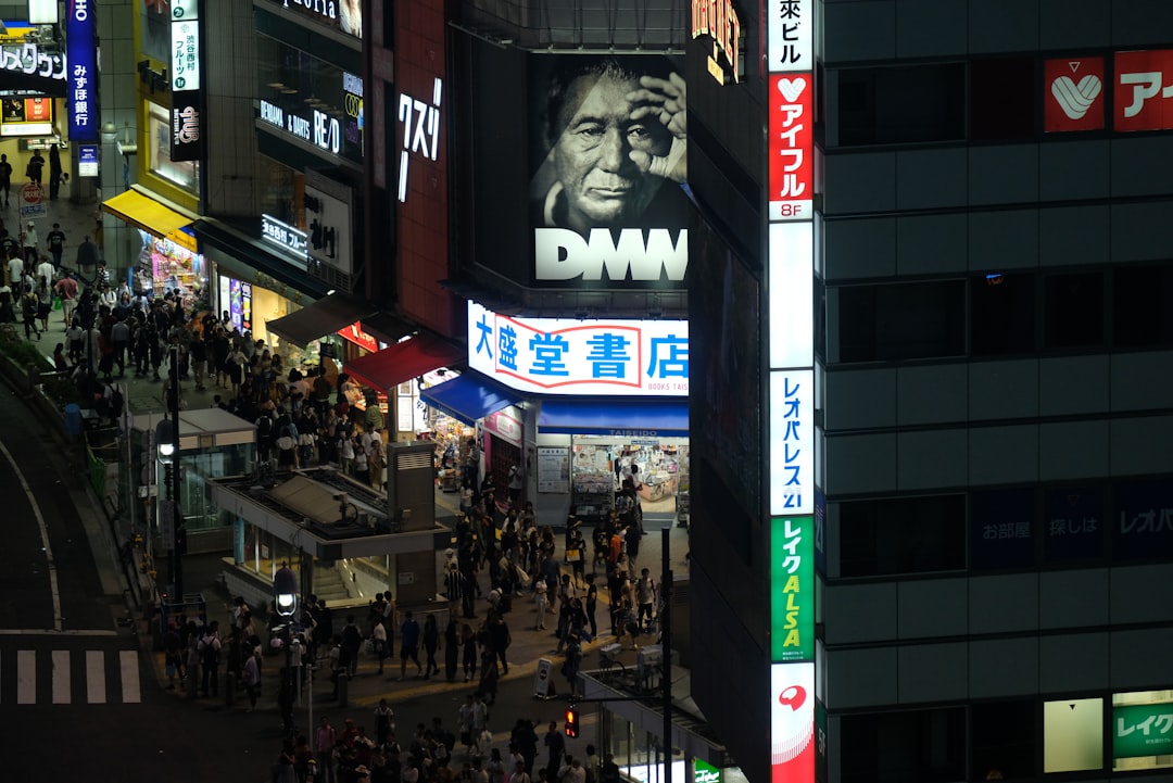 :fans arriving at the tokyo dome for a japanese baseball game