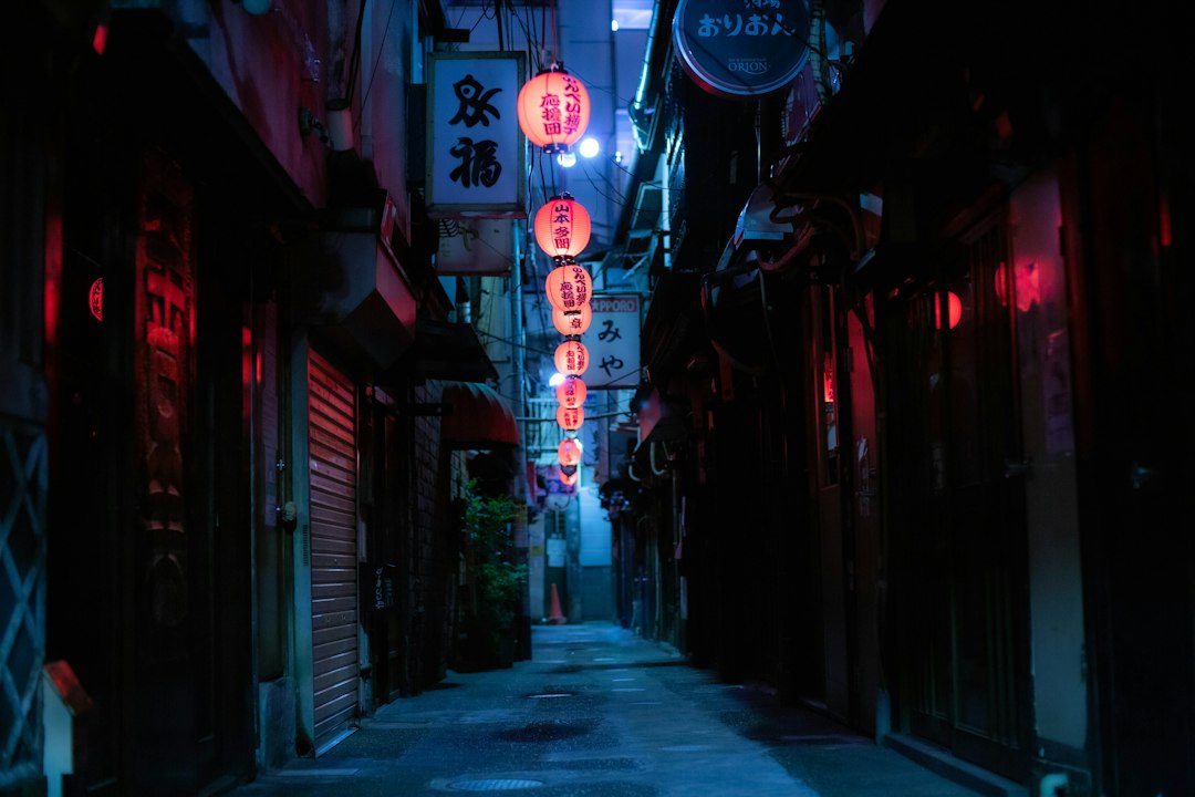 :backstreet ramen shops on dogenzaka in shibuya at night