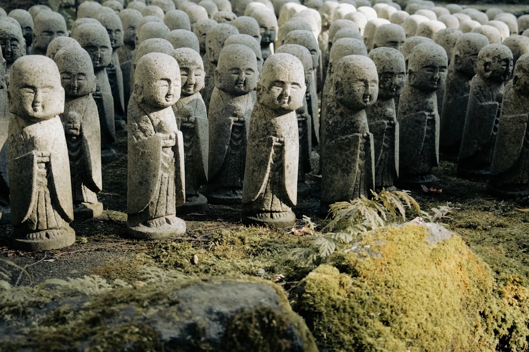 :stone rakan statues at kita-in temple in kawagoe