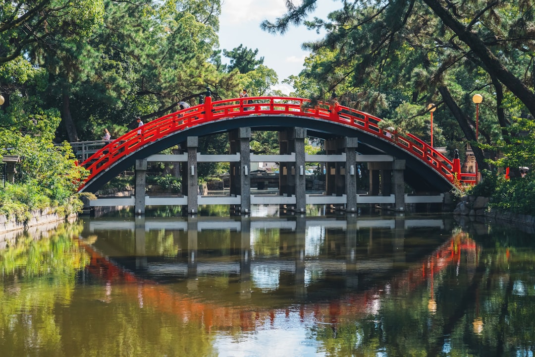 :the sorihashi arched bridge at sumiyoshi taisha shrine in osaka