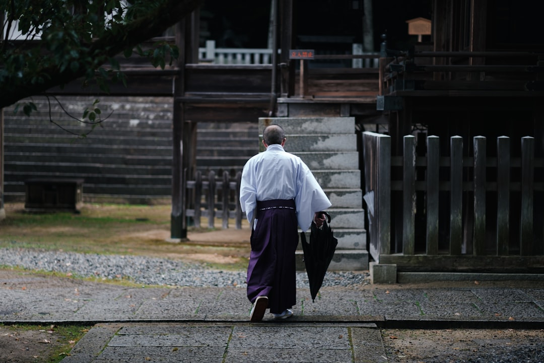 :young man wearing hakama for a coming of age ceremony in japan