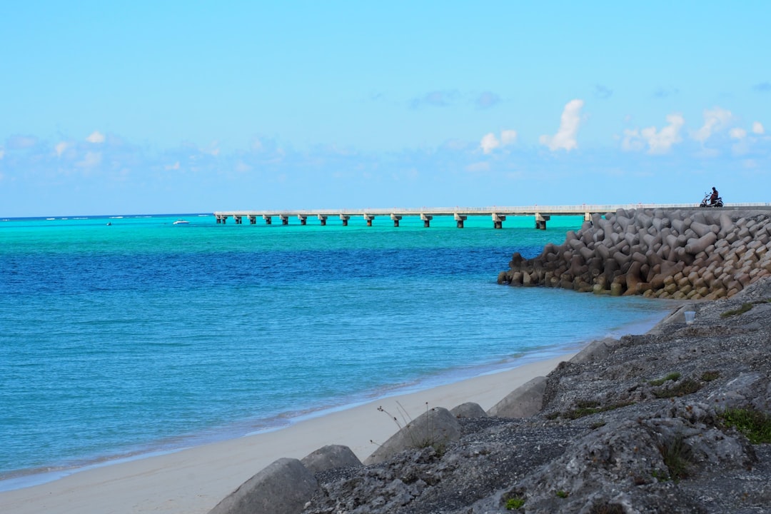:irabu bridge crossing clear blue water between miyakojima and irabu island