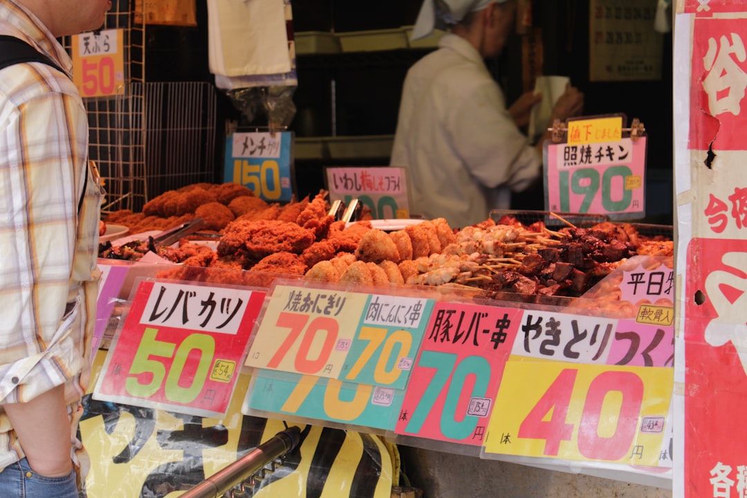 ：seafood stall selling crab and dried fish at ameyoko market in tokyo