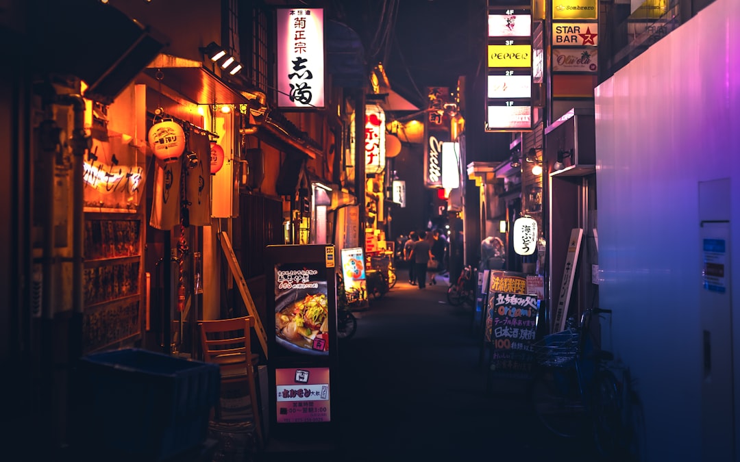 :pontocho alley lit by lanterns, the centre of kyoto nightlife