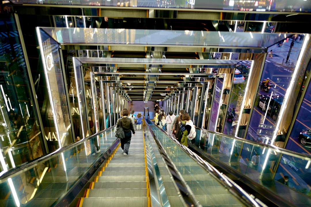 ：see-through escalator to the kuchu teien observatory at umeda sky building