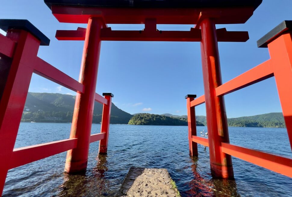 ：the lakeside torii gate of hakone shrine on lake ashi