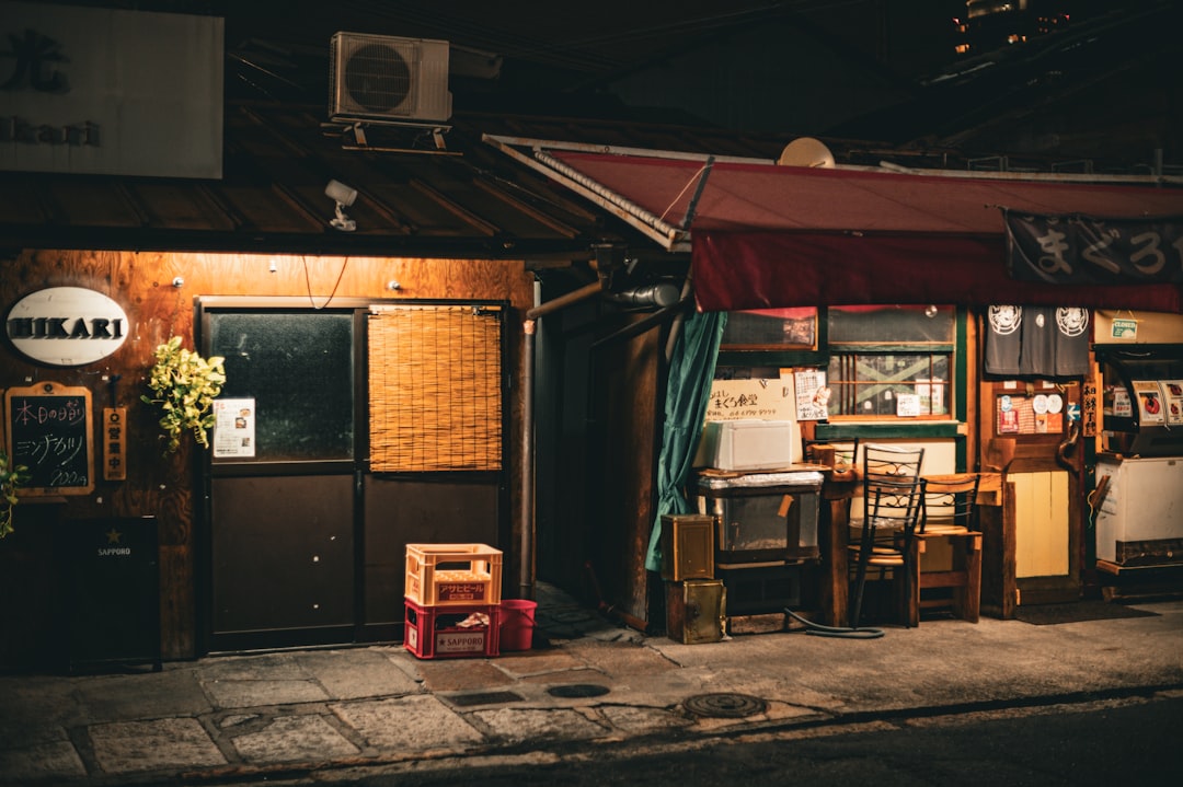 :izakaya counter with small dishes during a kyoto night out