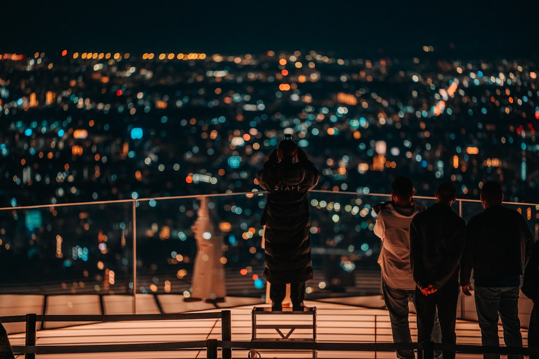 ：evening drinks at a rooftop bar at miyashita park in shibuya